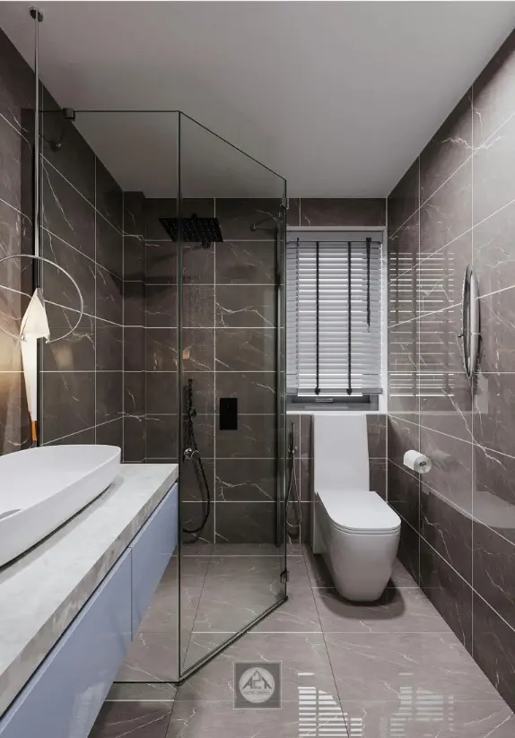 A bathroom with a glass shower doorDescription automatically generated
